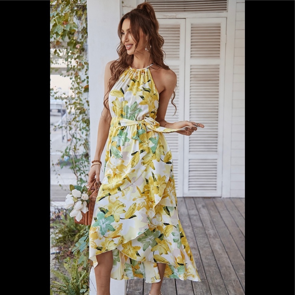 Halter neck floral print ruffle dress.